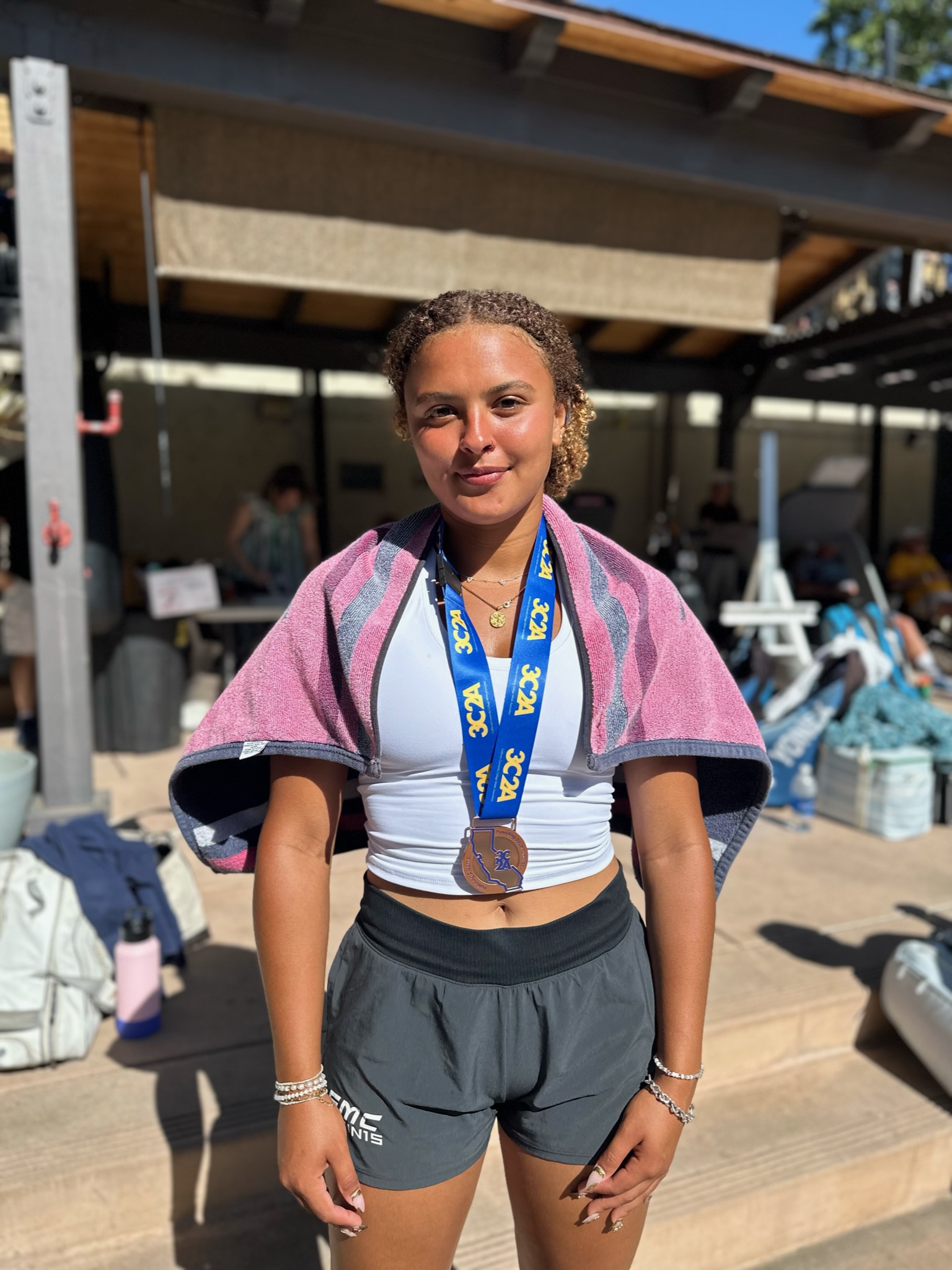 Anaya Ayanbadejo with the singles 3C2A medal